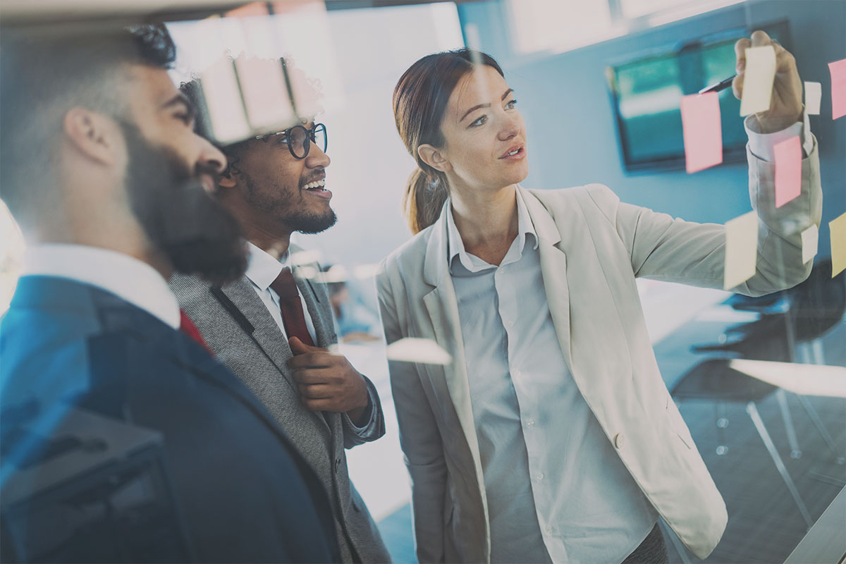 Team overcoming growth challenges through leadership training